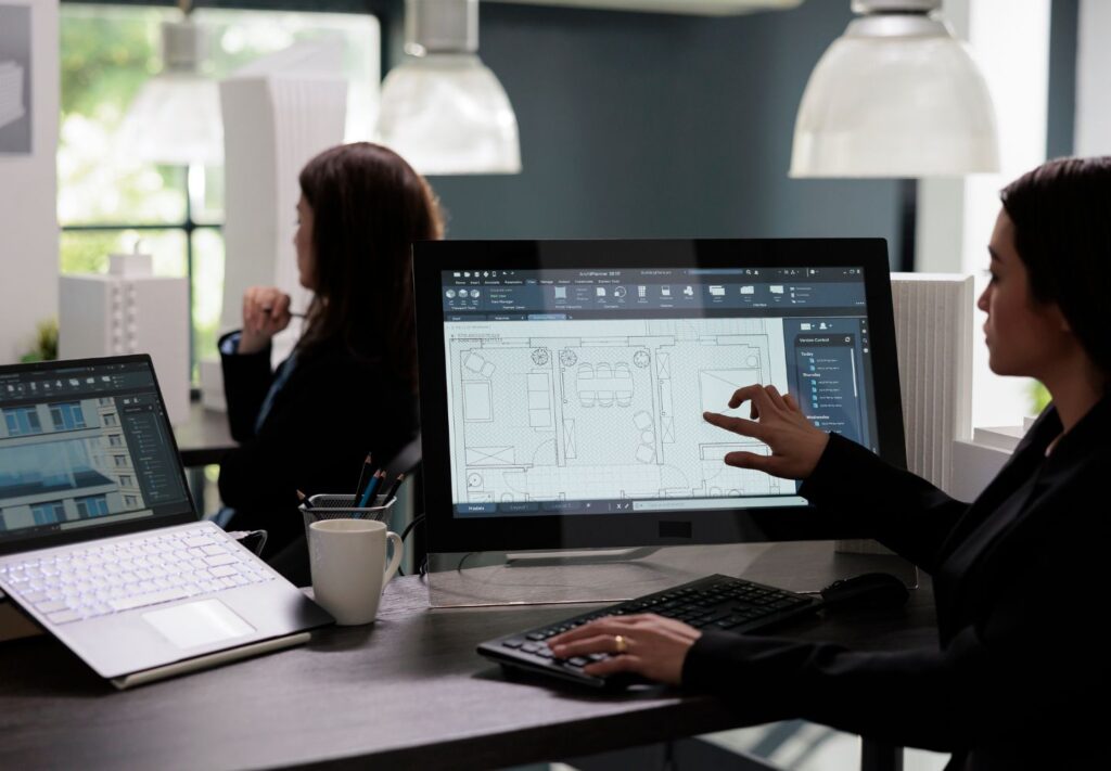 woman looking at computer screen with custom integrator software
