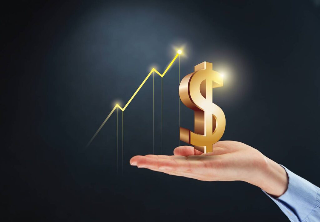 A hand presenting a symbolic rising financial graph and a dollar sign, suggesting economic growth or investment success.